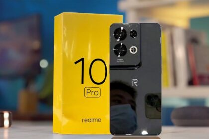 realme 10 pro 5g in black color with yellow color box on table