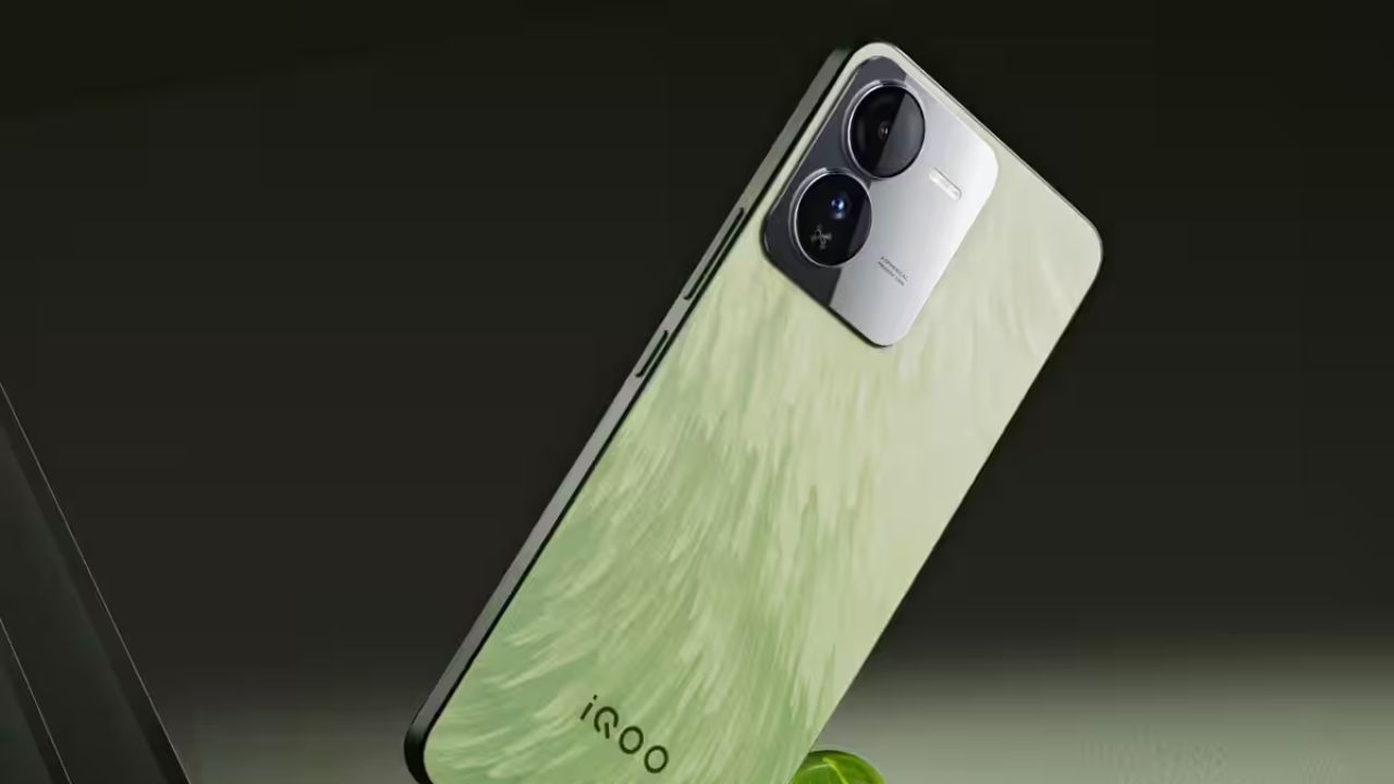 IQOO Z9 5G in lemon green color infront of plain black background