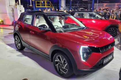 here is image of Red Colour Mahindra XUV 3XO car which is placed in mahindra car event