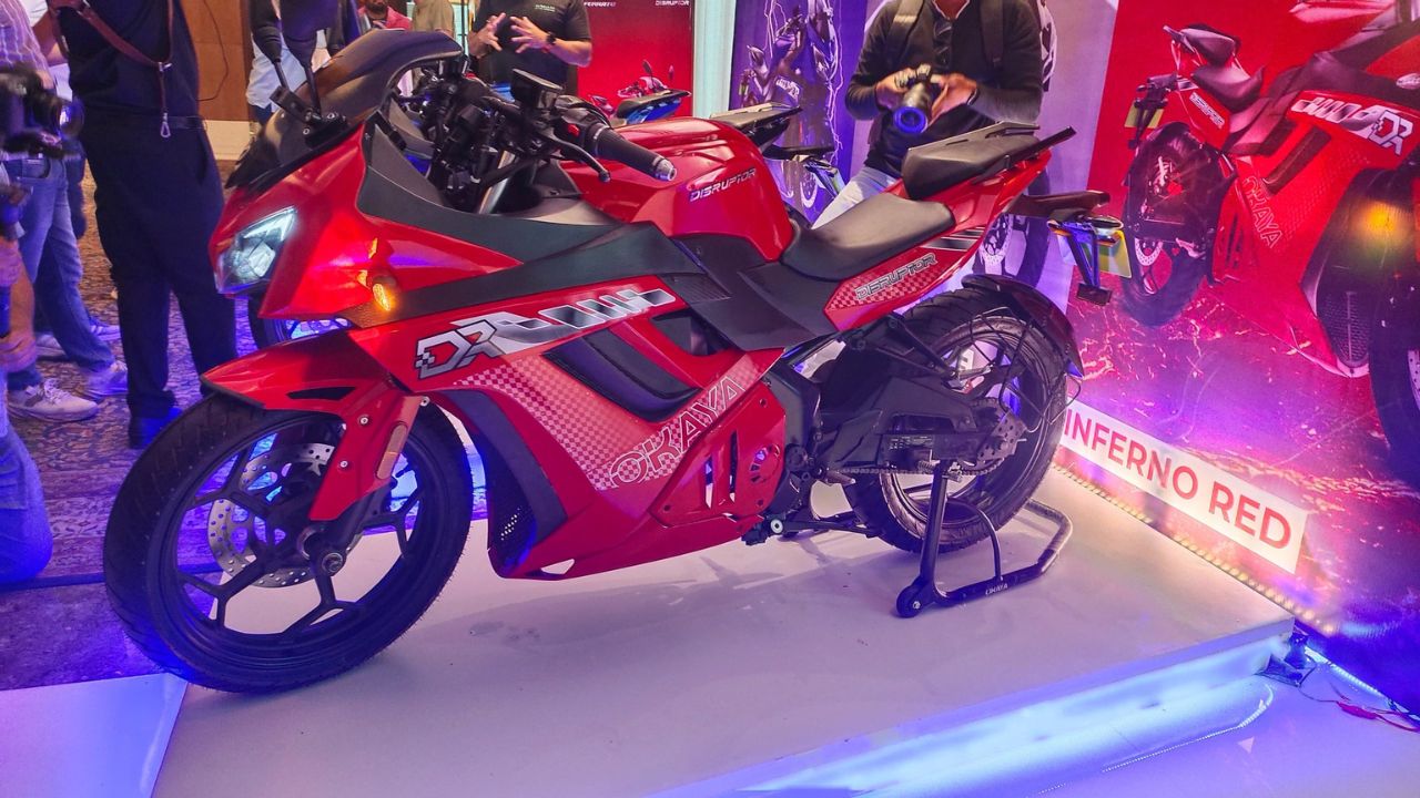 Here is image of Red colour Ferrato Disruptor EV Bike Which is placed in Showcase event