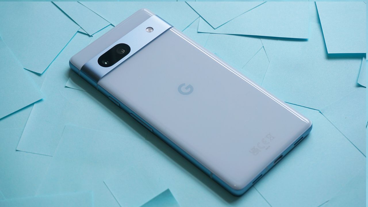 Google Pixel 8A in blue color on blue color table with phone side look