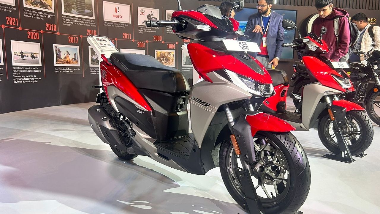Here is image of Red Colour Hero zoom 125 Scooter which is placed in Showcase event