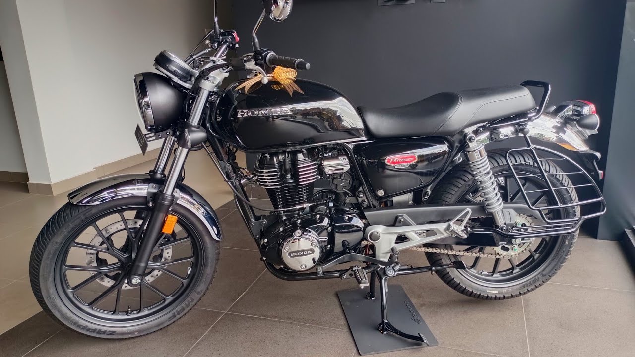 Here is Image of Black colour Honda Hness CB350 Bike Which is placed in showroom