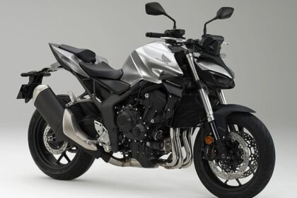 Here is Image of White and black colour Honda Hornet bike