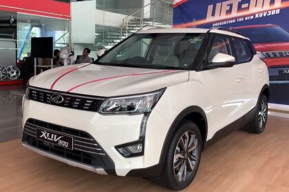 Here Is image of White colour Mahindra XUV300 Which is placed in showroom
