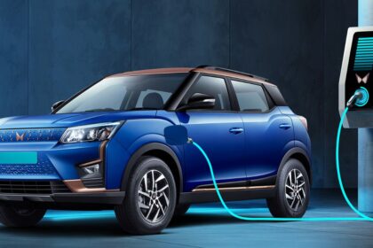 Here is image of blue colour Mahindra XUV400 Electric Car Which is on charging point