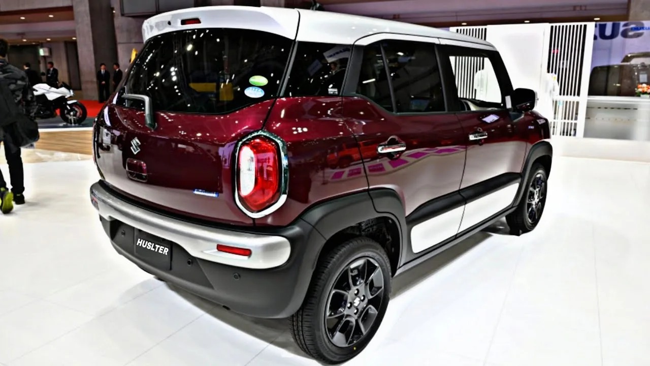 here is Image of Red colour Maruti Hustler car Which is placed in showroom