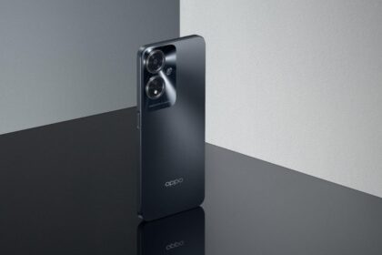 Oppo A59 5G in black color on black color table infront of grey wall