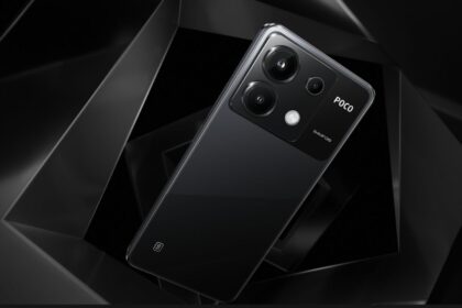 Poco 6 5G in black color infront of designed black color background