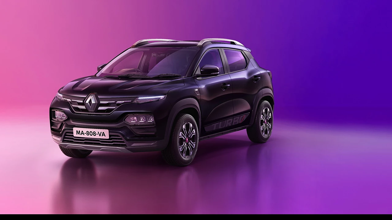 Here is image of Black colour Renault Kiger suv With colourfull background