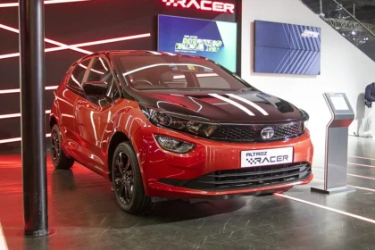 Here is Image of Black and Red Colour Tata Altroz New Car Which is placed in showroom