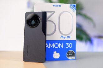 Tecno Camon 30 Pro in black color with box on table