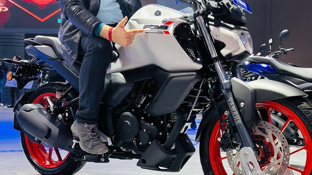 Here is image of a man sitting on a bike Yamaha FZS-FI V3 Which is in white colour