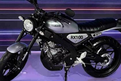 Here is image of black and silver colour Yamaha RX 100 which is placed in Showcase